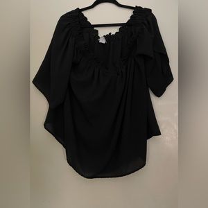 Plus Size Black polyester/spandex blend off the shoulder blouse